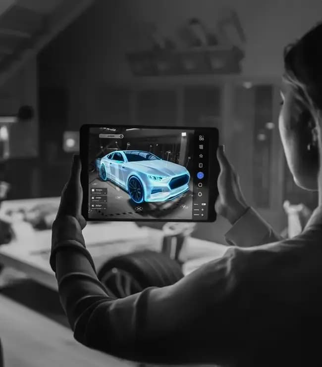 a girl watching the design of a car on a tablet